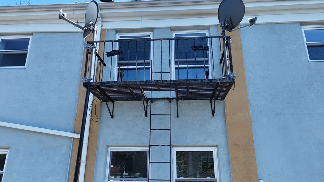 Drone field photograph, plate 144, 2026-04-24, New Jersey fire escape inspection by Oyster Fire Escape Inspections